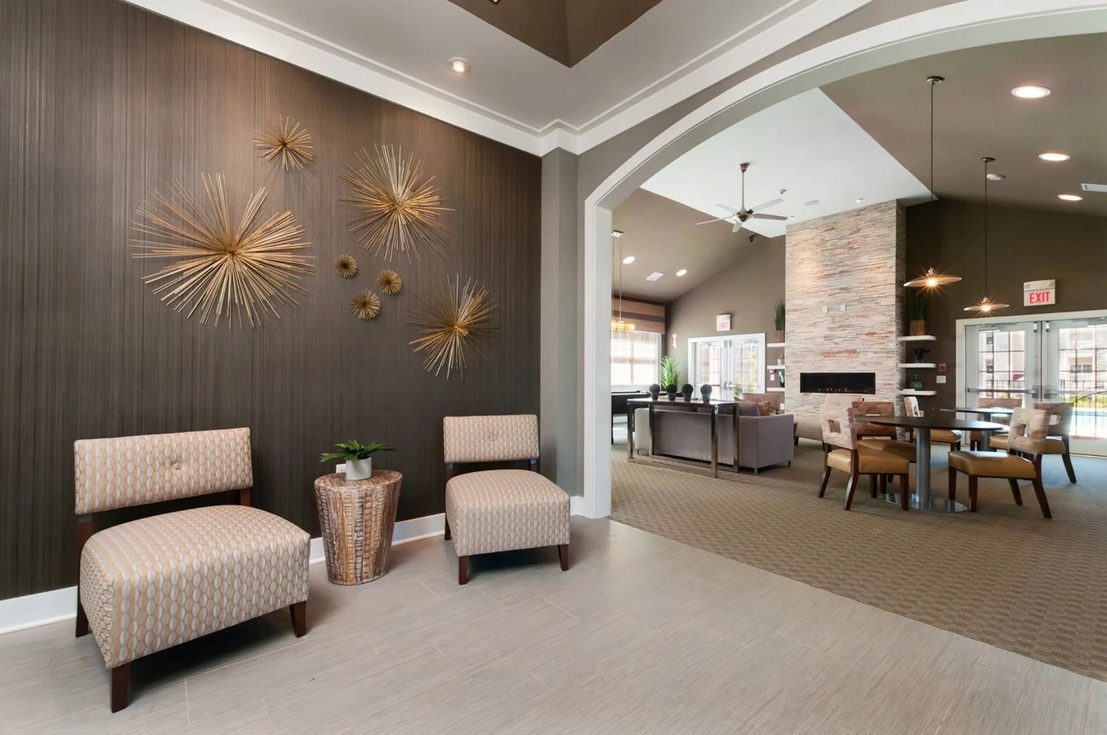 Clubhouse seating area beside the stacked-stone fireplace.